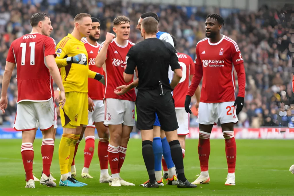 Nottingham Forest players protest against the referee